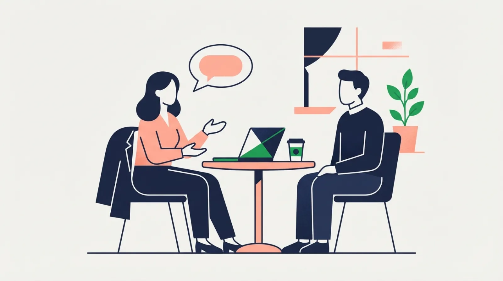 Una entrevista de trabajo: dos personas frente a frente en una mesa con un currículum y una computadora portátil